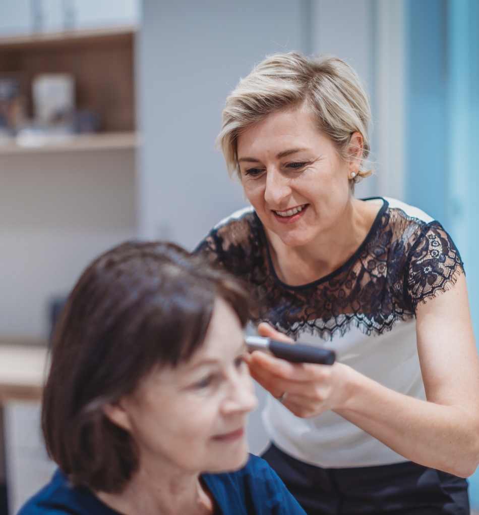 Doctor helping patient
